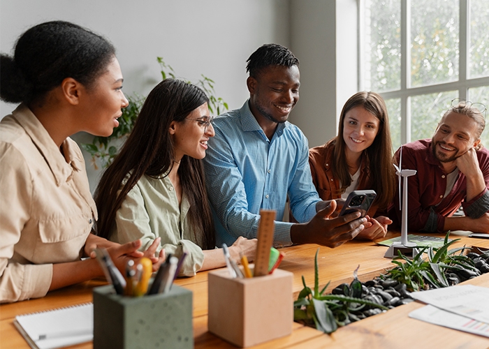 group of coworkers reviewing project