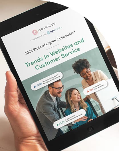 A person holds a tablet displaying a report titled 