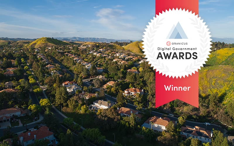 Aerial view of the City of Calabasas surrounded by rolling hills, highlighting the community served by streamlined parks and recreation services through digital forms.