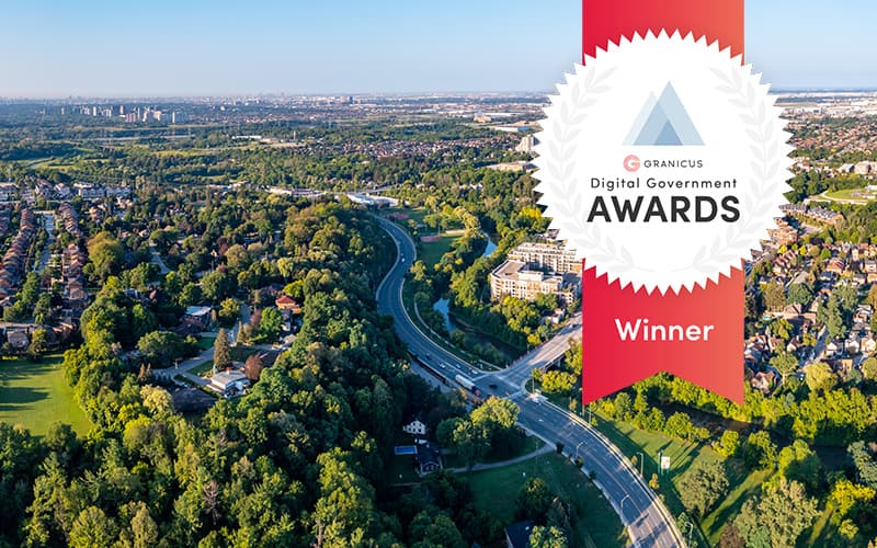 Aerial view of the City of Vaughan with a Digital Government Award winner badge, highlighting the city's recognized approach to digital services and permitting.