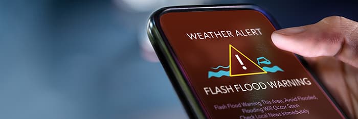 Local government flash flood alert on an iPhone