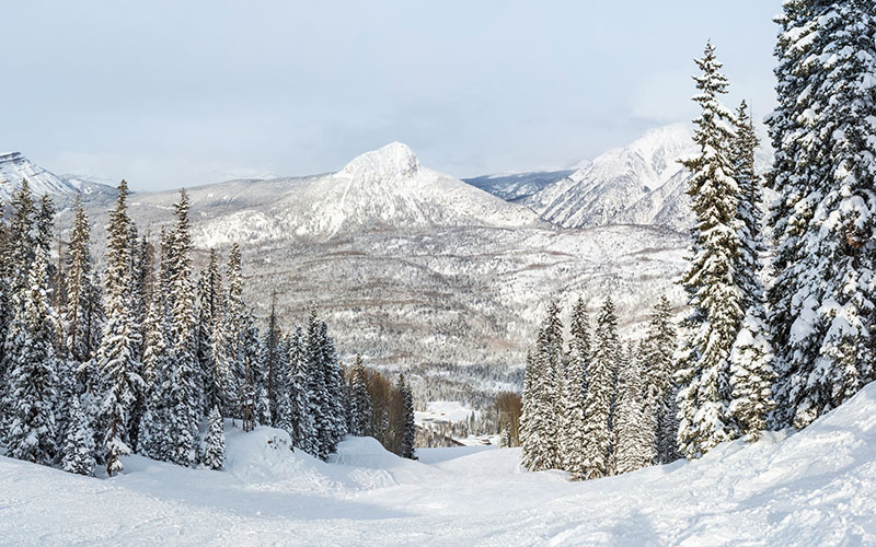 Ski run with mountain background at Purgatory Resort Colorado