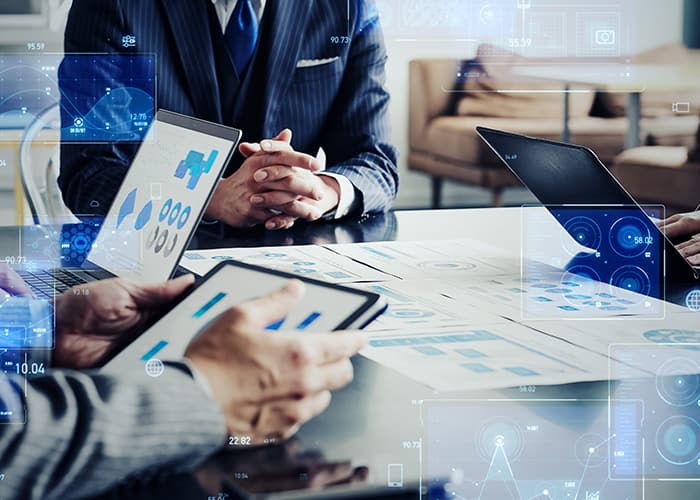 Group of business people meeting and digital technology concept