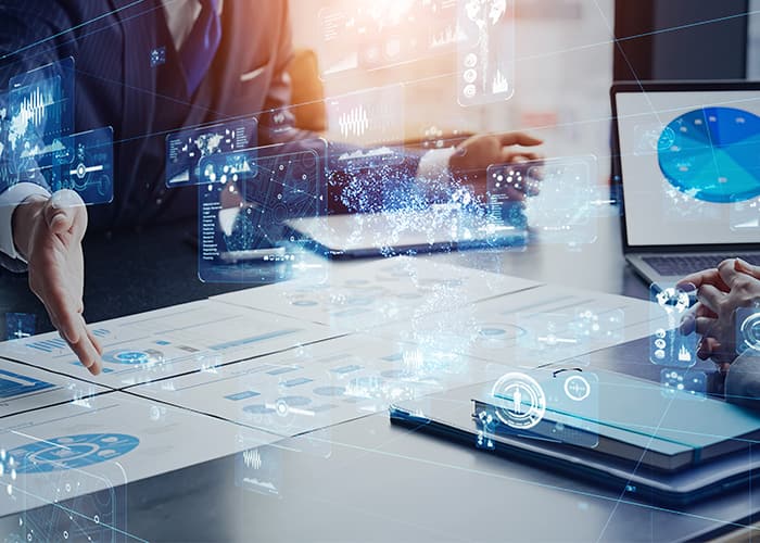 Group of business people meeting and digital technology concept
