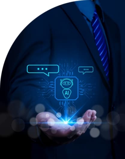 A business professional in a suit holding a glowing digital interface with AI and chatbot icons floating above the hand.
