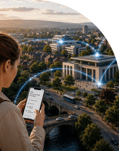 Person using a smartphone app overlooking a cityscape, with glowing digital connections linking buildings across an urban area.