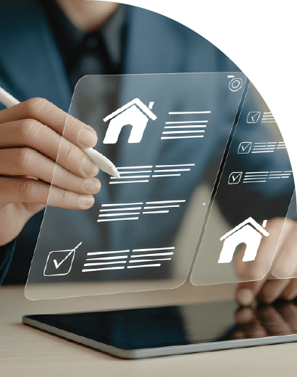 Businessman reviews real estate documents on laptop