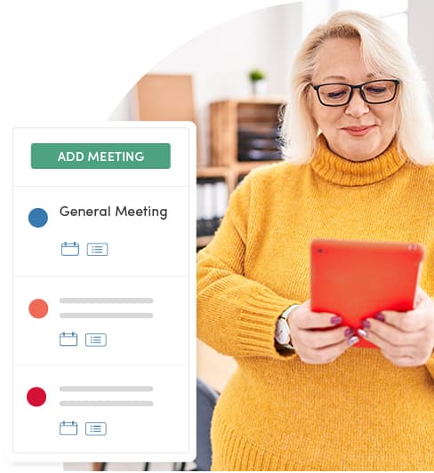 A government clerk in a yellow sweater uses a red tablet, smiling. She stands beside a digital calendar interface with an 