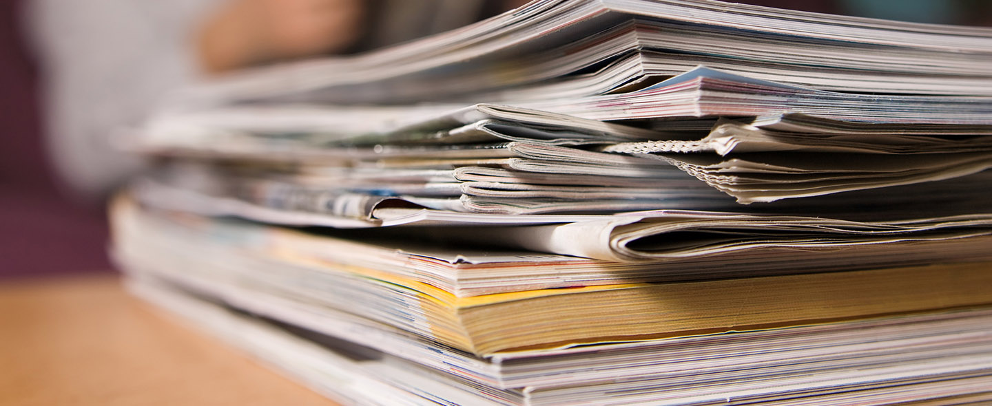 stack of paper on a desk