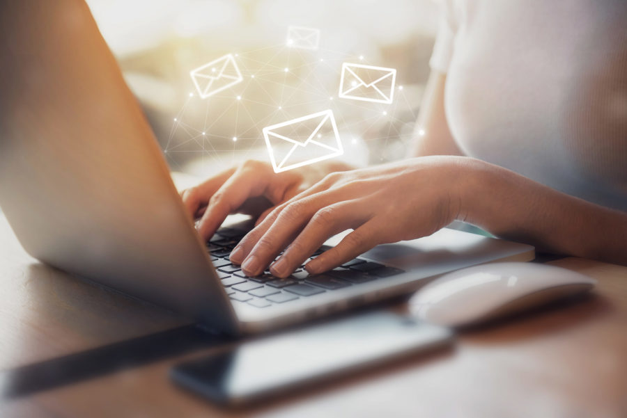 5 Tips for Sprucing Up Your Email Content image blog-hands-typing-iStock-687923918