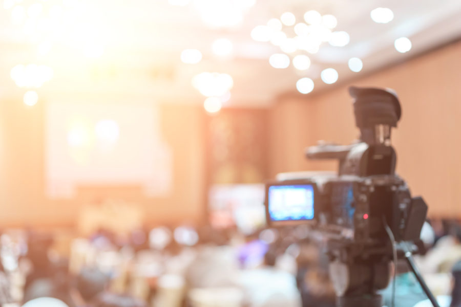 4 Reasons Why Your Agency Needs Video Closed Captioning image vdo camera in conference room for frofession