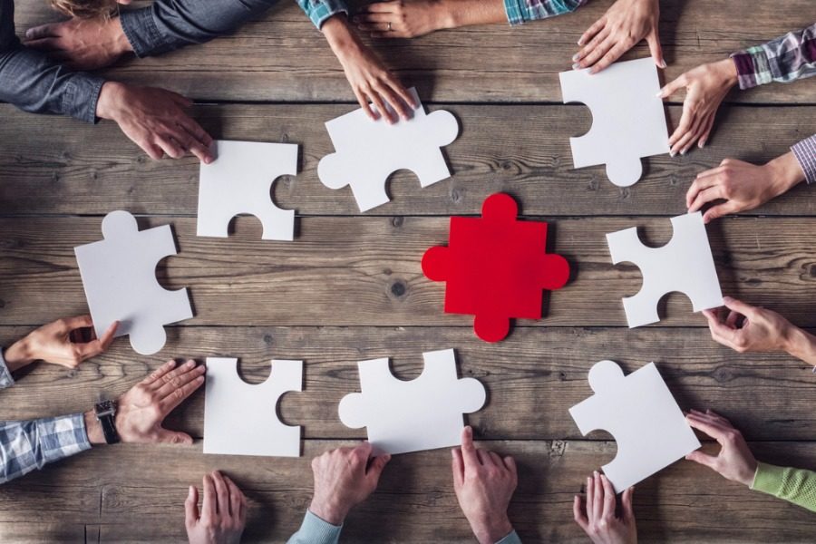 What the Novusolutions Acquisition Means for Your Future with Granicus image teamwork-meeting-concept-picture-id588960966