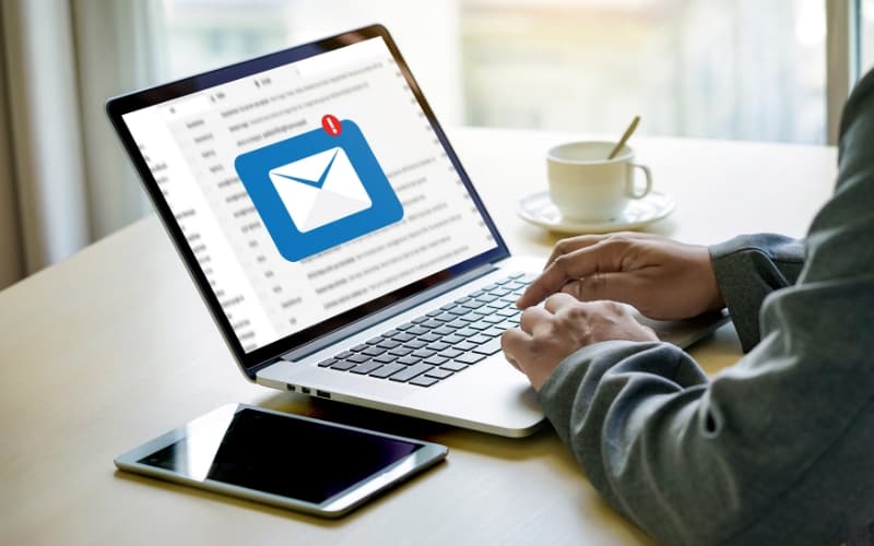 Laptop showing an email alert, highlighting the importance of choosing the right email platform for public sector use.