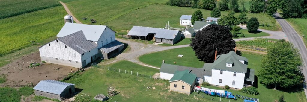 A small farm in Ohio with home and farming building structures
