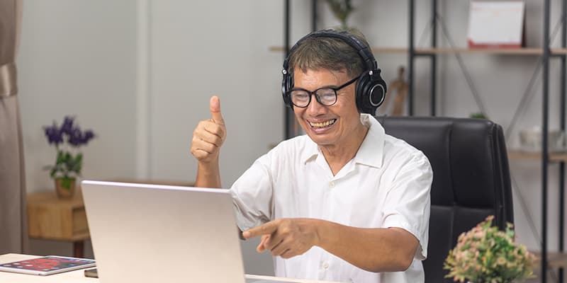 Seniors man is learning to upskill AI technology.
